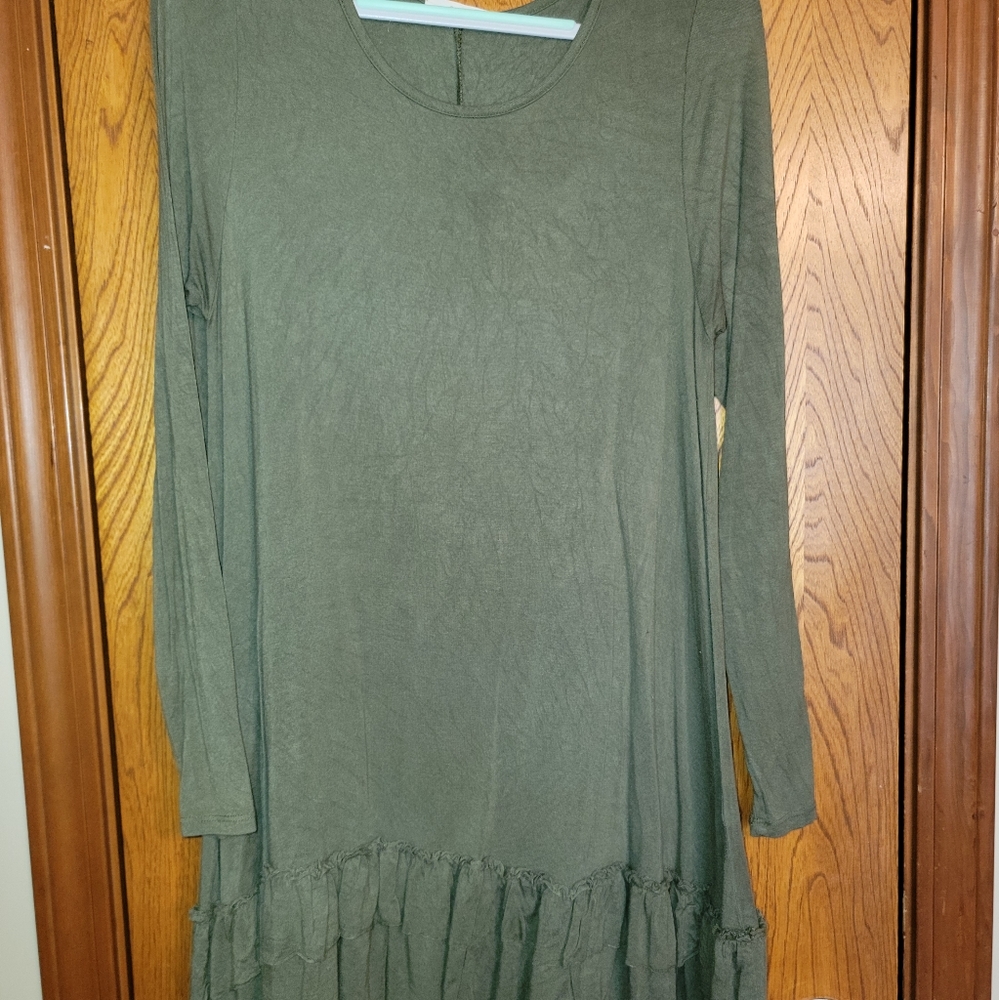 Green knit tunic with ruffles